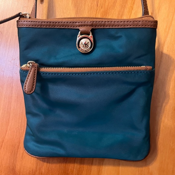 Teal, Michael Kors crossbody, Blemish on back of purse at bottom as pictured - Picture 2 of 3